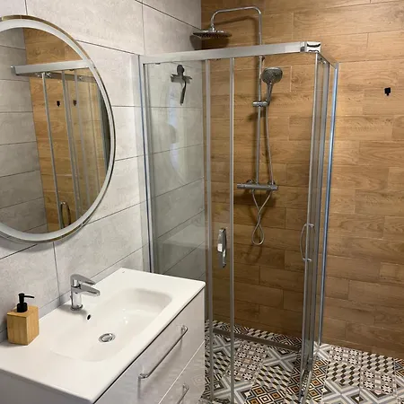 Skarbowa 1a Lux 4 & Parking Апартаменты *